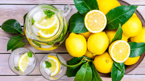 lemon water and lemons featured