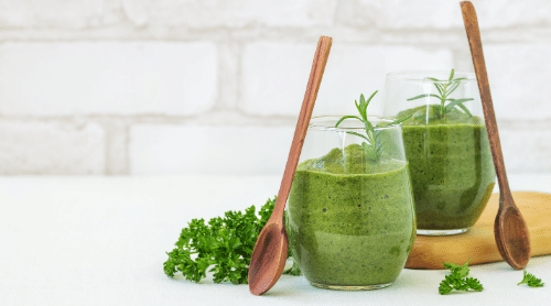 green smoothies in glasses featured