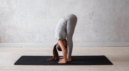 forward fold yoga pose featured