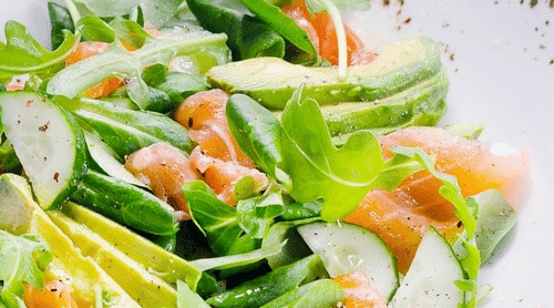 salad with avocado and salmon featured