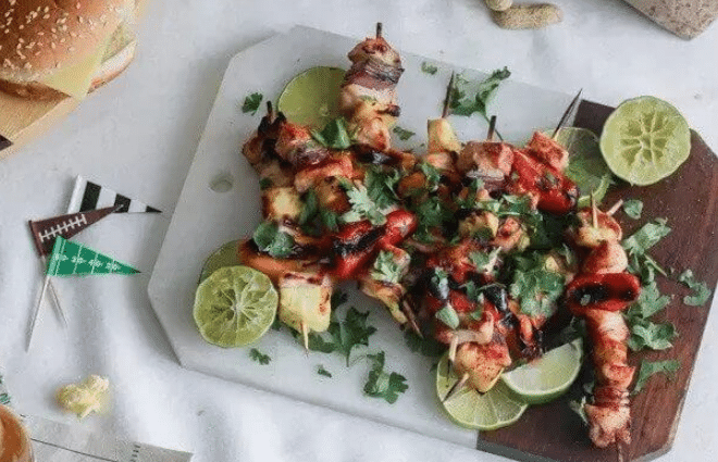 grilled bbq chicken kababs on plate