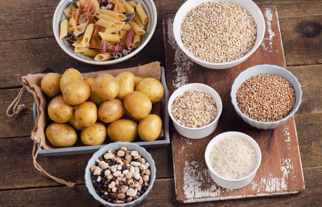 display of starchy carbs potatoes pasta grains legumes etc.